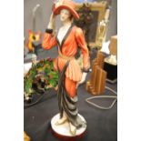 Large ceramic lady figurine in 1920 style dress. P&P Group 2 (£18+VAT for the first lot and £3+VAT