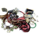 Mixed vintage costume jewellery, including a jade-type bangle, further metal bangles, earrings,