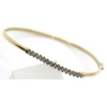 9ct gold diamond set bangle, mis-shapen, 4.1g. P&P Group 1 (£14+VAT for the first lot and £1+VAT for
