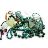 Selection of jade type, malachite, pearl and turquoise necklaces, with a single butterscotch amber