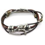 White metal Tibetan silver and leather gents Gothic type bracelet, L: 20 cm. P&P Group 1 (£14+VAT