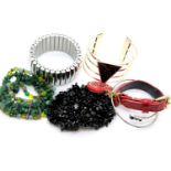 Collection of mixed costume jewellery bangles and bracelets. P&P Group 1 (£14+VAT for the first