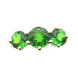 9ct gold dress ring set with a trio of green stones, size K/L, 1.7g. P&P Group 1 (£14+VAT for the