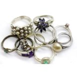 Nine silver stone set rings including an emerald and diamond, total weight 29g. P&P Group 1 (£14+VAT