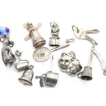 Twelve silver and white metal charms. P&P Group 1 (£14+VAT for the first lot and £1+VAT for