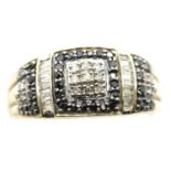 9ct gold black and white diamond set ring, size O, 4.2g, two stones missing. P&P Group 1 (£14+VAT