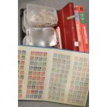 Quantity of loose stamps in tubs, albums and reference books. This lot is not available for in-house