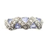 9ct white gold tanzanite and diamond set dress ring, size P, 3.3g. P&P Group 1 (£14+VAT for the