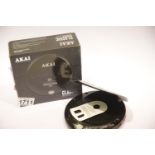 Boxed Akai Class CD Discman digital player, model A61007; batteries, earphones and manual, complete,