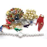 Butler and Wilson unboxed jewellery, including a large peacock bangle, two pendant necklaces, two