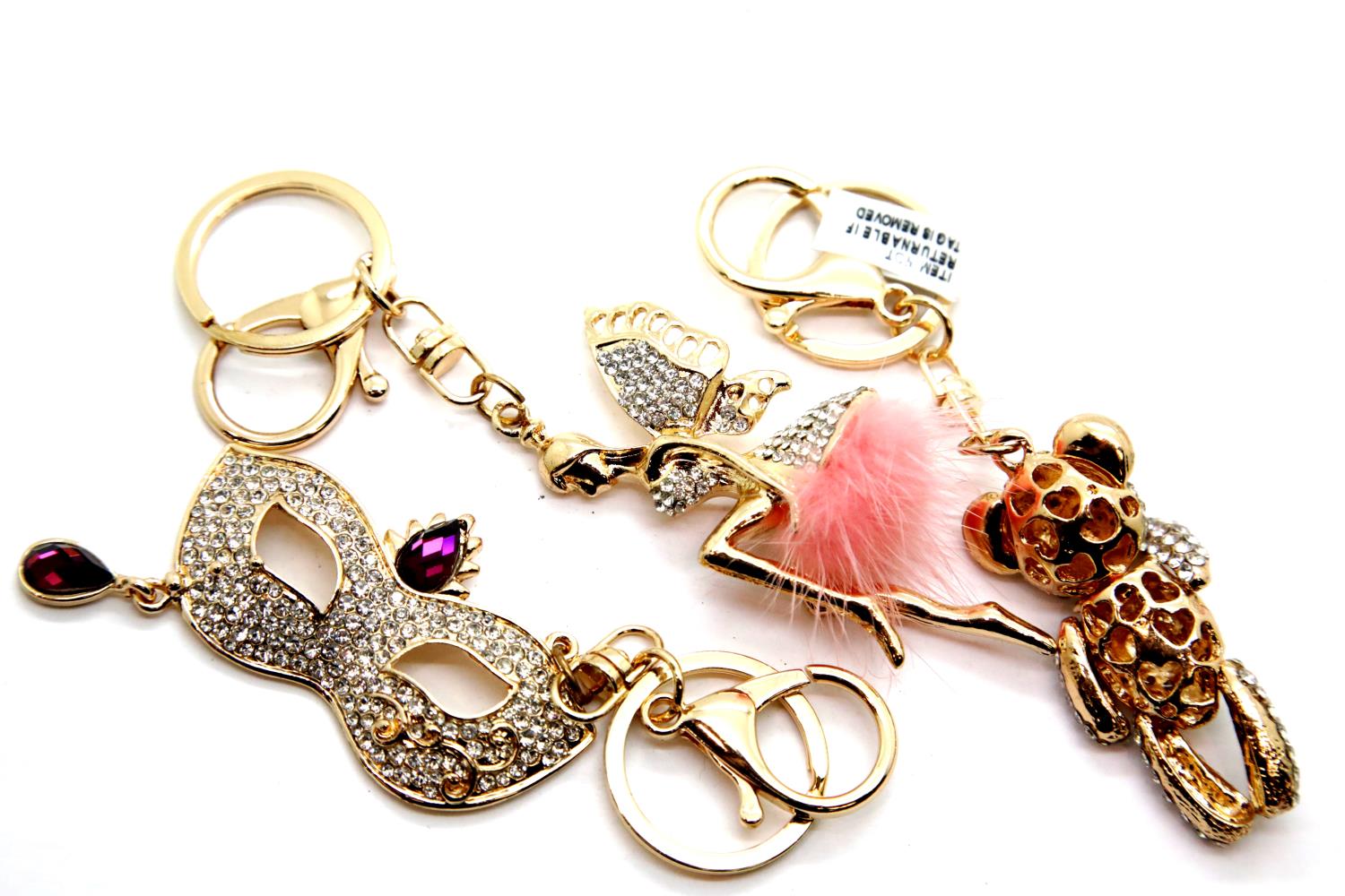 Three studded keyrings. P&P Group 1 (£14+VAT for the first lot and £1+VAT for subsequent lots)