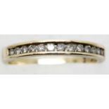 9ct gold ring set with thirteen diamonds, 2.1g size Q. P&P Group 1 (£14+VAT for the first lot and £