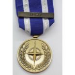 Boxed United Nations medal with ISAF bar. P&P Group 1 (£14+VAT for the first lot and £1+VAT for