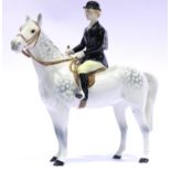 Beswick female rider on dapple grey horse. P&P Group 2 (£18+VAT for the first lot and £3+VAT for