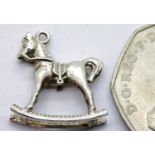 Silver rocking horse charm. P&P Group 1 (£14+VAT for the first lot and £1+VAT for subsequent lots)