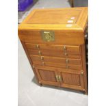 Small Chinese hardwood cutlery cupboard with four drawers and lifting top. Not available for in-