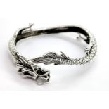 Silver dragon bangle, 153g. P&P Group 1 (£14+VAT for the first lot and £1+VAT for subsequent lots)