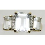 9ct gold ring set with three large white stones and small diamonds, size J/K, 3.2g. P&P Group 1 (£