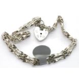 Silver three bar vintage gate bracelet with padlock clasp. P&P Group 1 (£14+VAT for the first lot