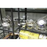 Mixed silver plate, including tea services, circular tray, toast rack etc. Not available for in-