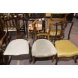 Three Victorian parlour chairs, including an inlaid walnut example, an elbow chair of small