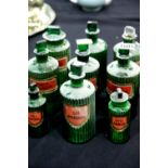 Nine vintage green glass apothecary poison bottles with labels, H: 20 cm. P&P Group 3 (£25+VAT for