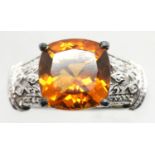 925 silver ring with large orange stone with diamond shoulders, size Q, 4.9g. P&P Group 1 (£14+VAT