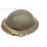 British WWII type D Day helmet with side Royal Artillery decal. P&P Group 3 (£25+VAT for the first