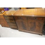 Reproduction mahogany bow front chest of four drawers, together with a similar two door two drawer