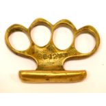 BC42 MKII military issue brass knuckle duster with broad arrow stamp. P&P Group 1 (£14+VAT for the