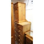 A modern pine chest of two short above four long drawers having shaped upstand, 121 x 80 x 46 cm,