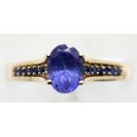 Ladies American 10ct gold blue stone ring, size P, 2.7g. P&P Group 1 (£14+VAT for the first lot