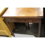 George III mahogany fold over tea table with single drawer, raised on tapering legs. Not available