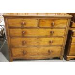 George III inlaid mahogany chest of two short over three long drawers, with turned handles and