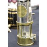 19thC polished brass and steel miner's lamp, the brass plate stamped 461, H: 23 cm. P&P Group 2 (£