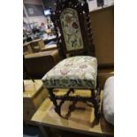 Heavily carved 19th century oak framed upholstered hall chair with high back and twist supports. Not