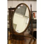 Large Edwardian inlaid mahogany framed toilet swing mirror with later additions. Not available for