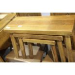 Nest of three contemporary graduated golden oak occasional tables. Not available for in-house P&P.