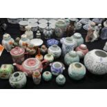 Large quantity of Oriental ceramics including tea pots, ginger jars etc. Not available for in-