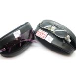 Two pairs of Giorgio Armani ladies sunglasses in original cases, one vintage one modern. P&P Group 1