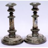 Pair of silver plated heavy candlesticks with stylised decoration, H: 21 cm. P&P Group 1 (£14+VAT