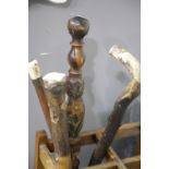Three vintage Bavarian walking sticks, and a further cane with ivory finial. P&P Group 3 (£25+VAT