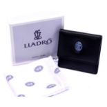 Boxed Lladro leather purse. P&P Group 1 (£14+VAT for the first lot and £1+VAT for subsequent lots)