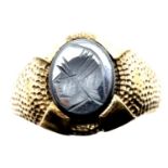 9ct gold haematite intaglio set ring, size U, 5.3g. P&P Group 1 (£14+VAT for the first lot and £1+