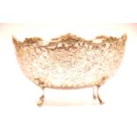 London imported hallmarked silver glass lined sweetmeats bowl, the silver body raised on four clawed