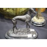Bronze sculpture model of a greyhound on a marble base, H: 30 cm. Not available for in-house P&P.