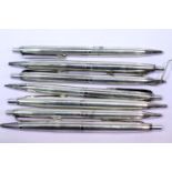 Seven Bolascrip German 900 silver push button pencils (leads still available). P&P group 1 (£14