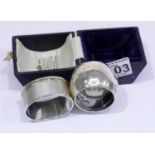 Two hallmarked silver napkin rings, one boxed, 83g. P&P Group 1 (£14+VAT for the first lot and £1+