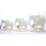Three Ghanaian ivory elephants, purchased during WWII, L: 4.5 cm, 5.5 cm and 7 cm. P&P Group 1 (£