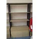 Five large illuminated display shelves, each 200 cm high, in good condition. Not available for in-